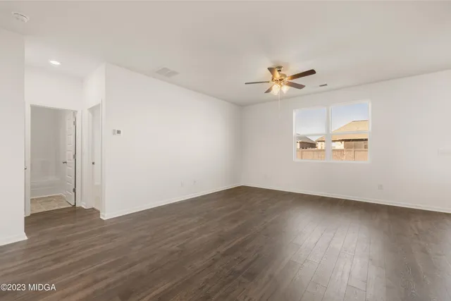 a view of a bathroom with a glass door shower