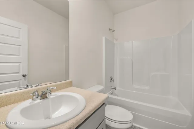 a view of hallway with white walls