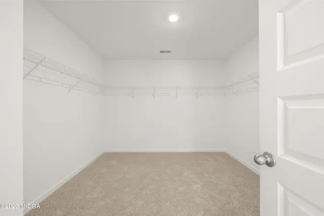 a view of small space with racks on the wall