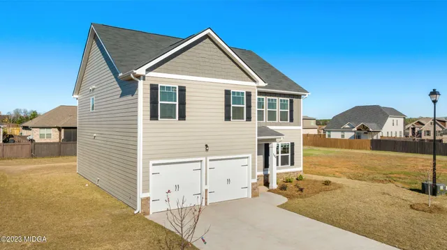 a view of swimming pool with a yard