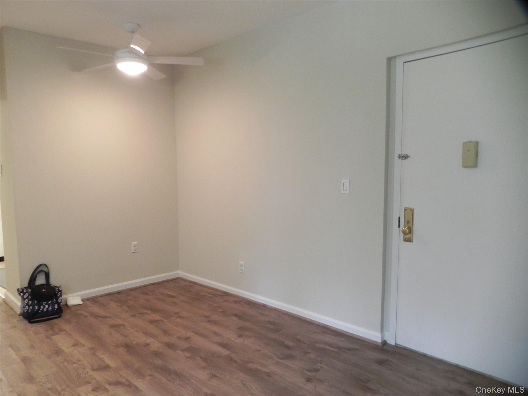 1250 North Avenue, Unit 110 New Rochelle, NY 10804 - Photo 6 of 27 Room with wood finished floors and a ceiling fan
