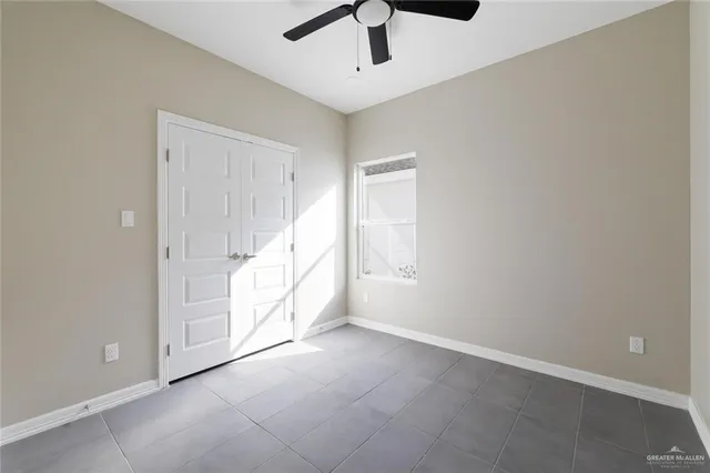 an empty room with fan