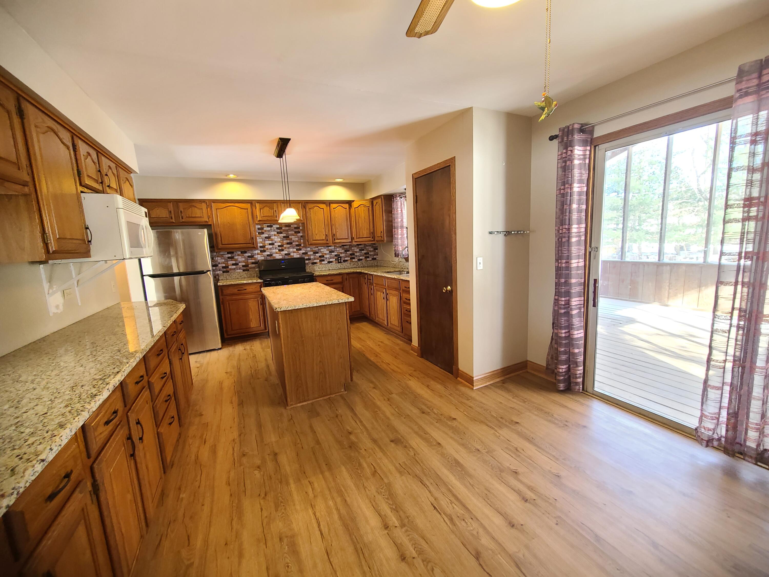 13291 County Road 700 West Demotte, IN 46310 - Photo 13 of 33 a view of a living room and dining room