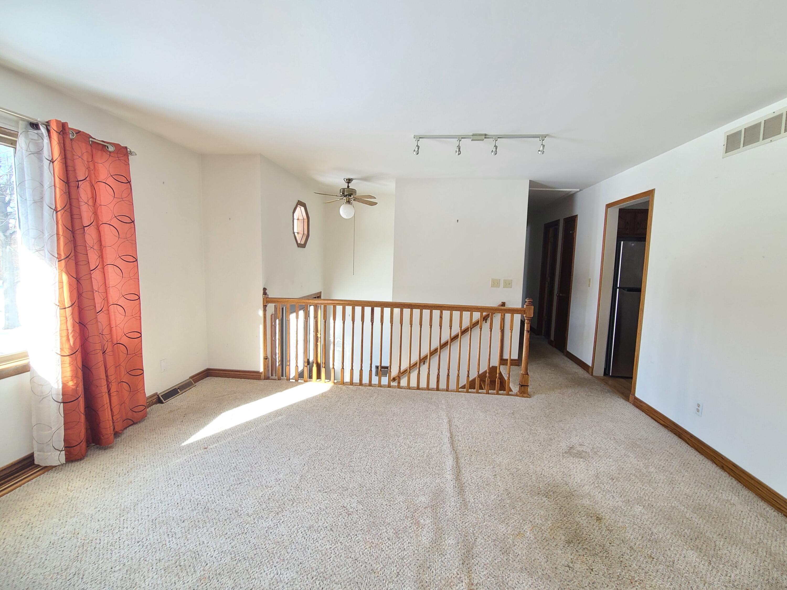 13291 County Road 700 West Demotte, IN 46310 - Photo 18 of 33 a view of a balcony with staircase