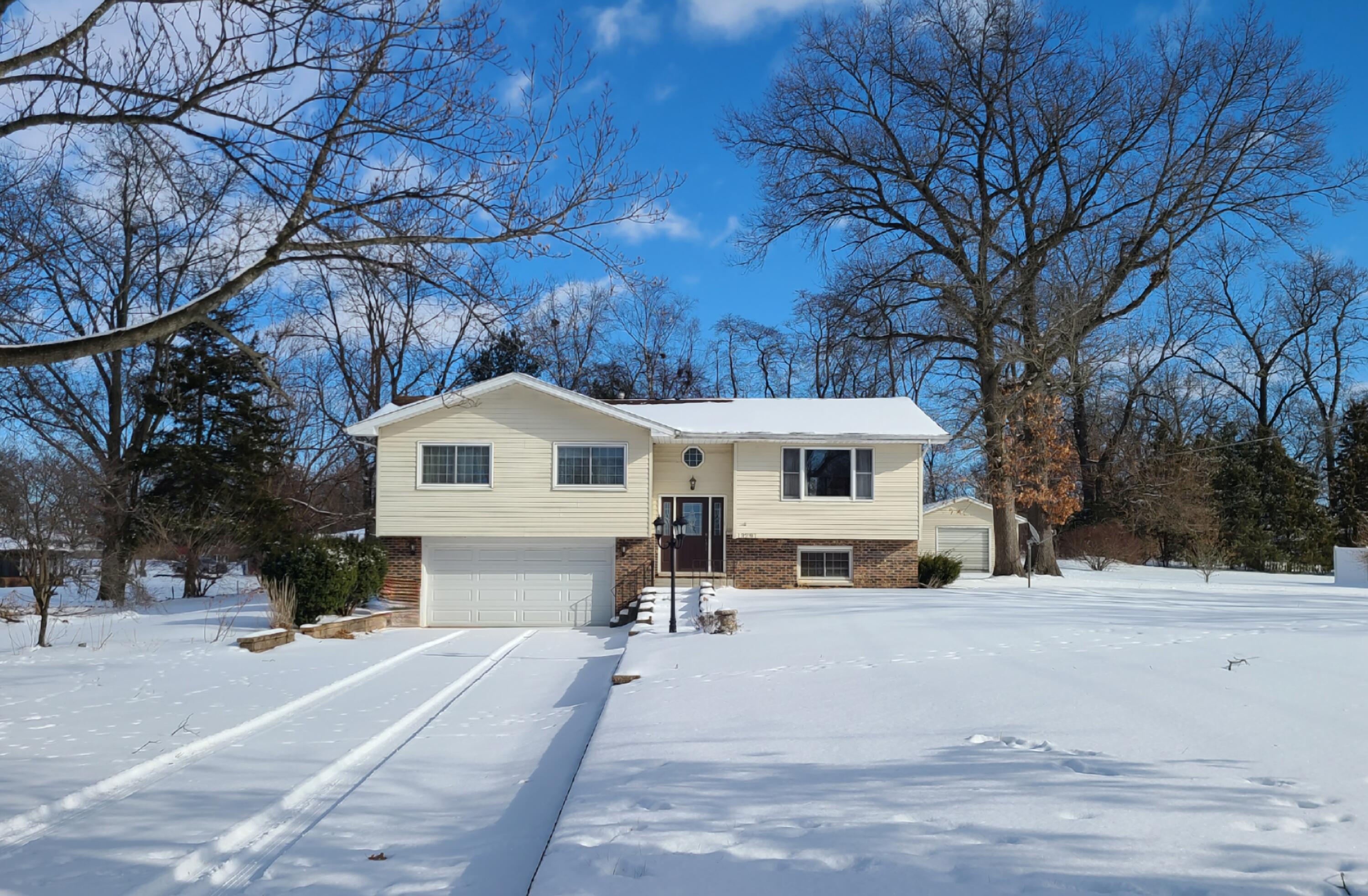 13291 County Road 700 West Demotte, IN 46310 - Photo 2 of 33 a front view of a house with a yard