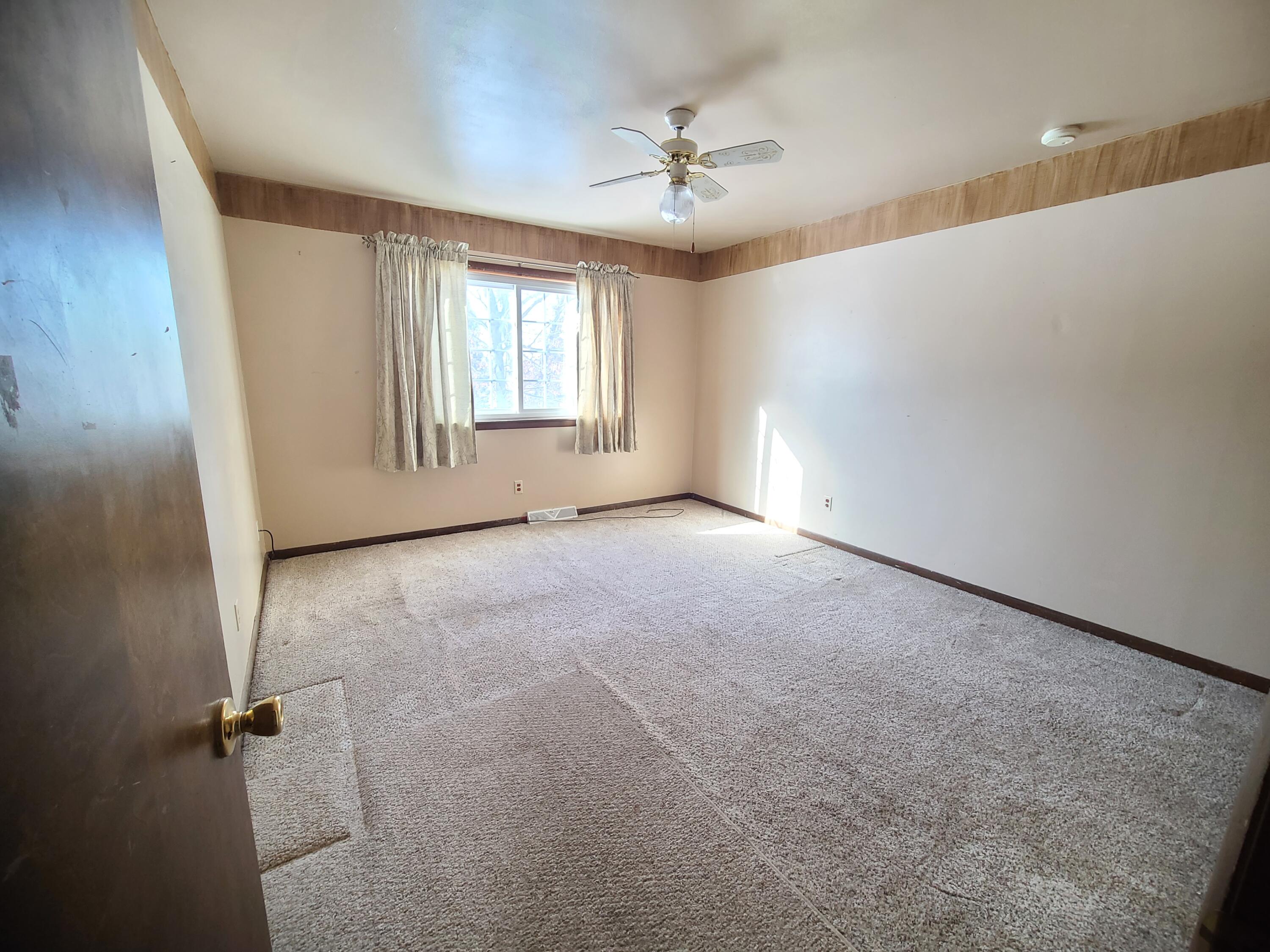 13291 County Road 700 West Demotte, IN 46310 - Photo 24 of 33 a view of an empty room with a window