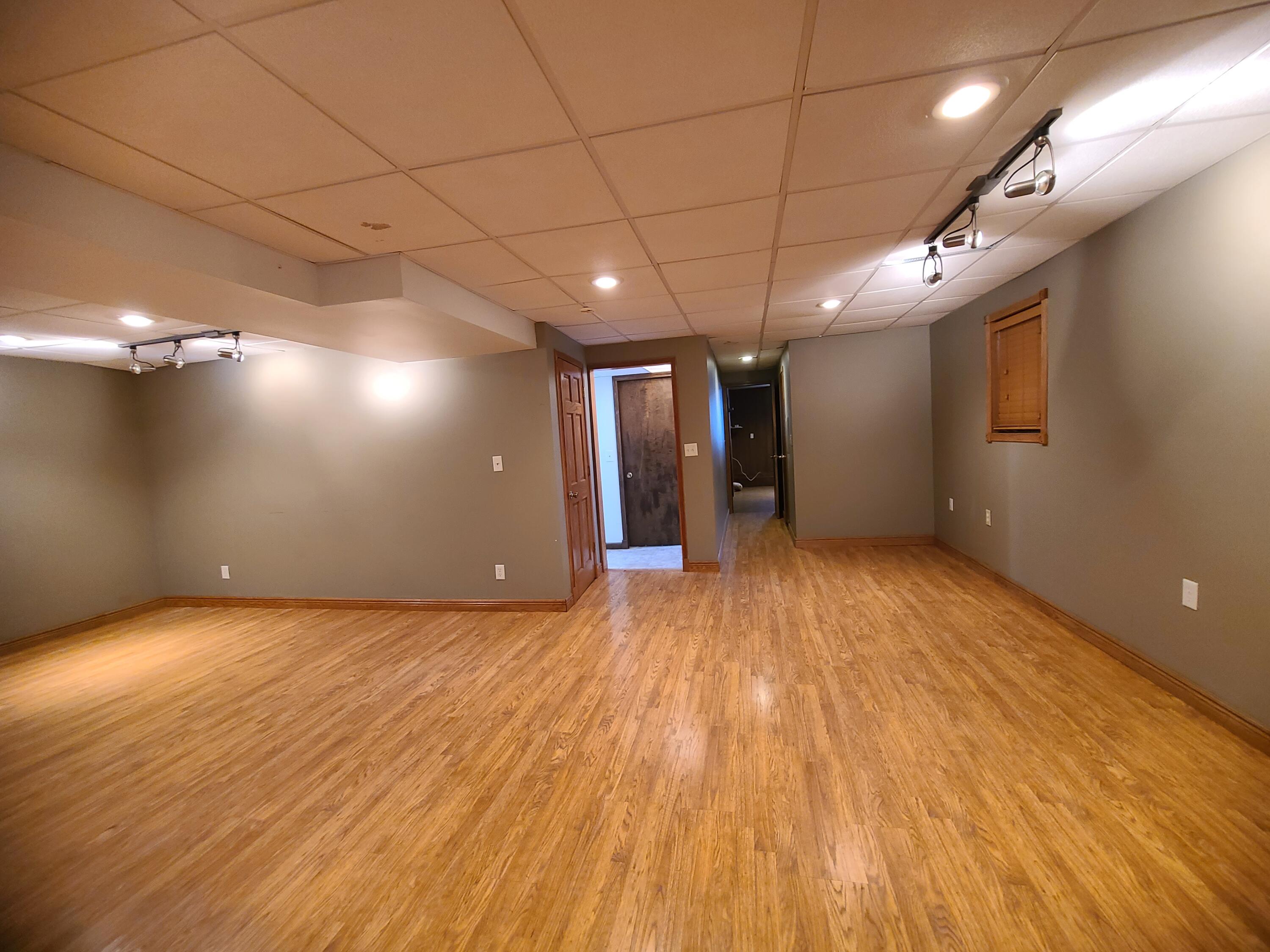 13291 County Road 700 West Demotte, IN 46310 - Photo 31 of 33 a view of an empty room with wooden floor