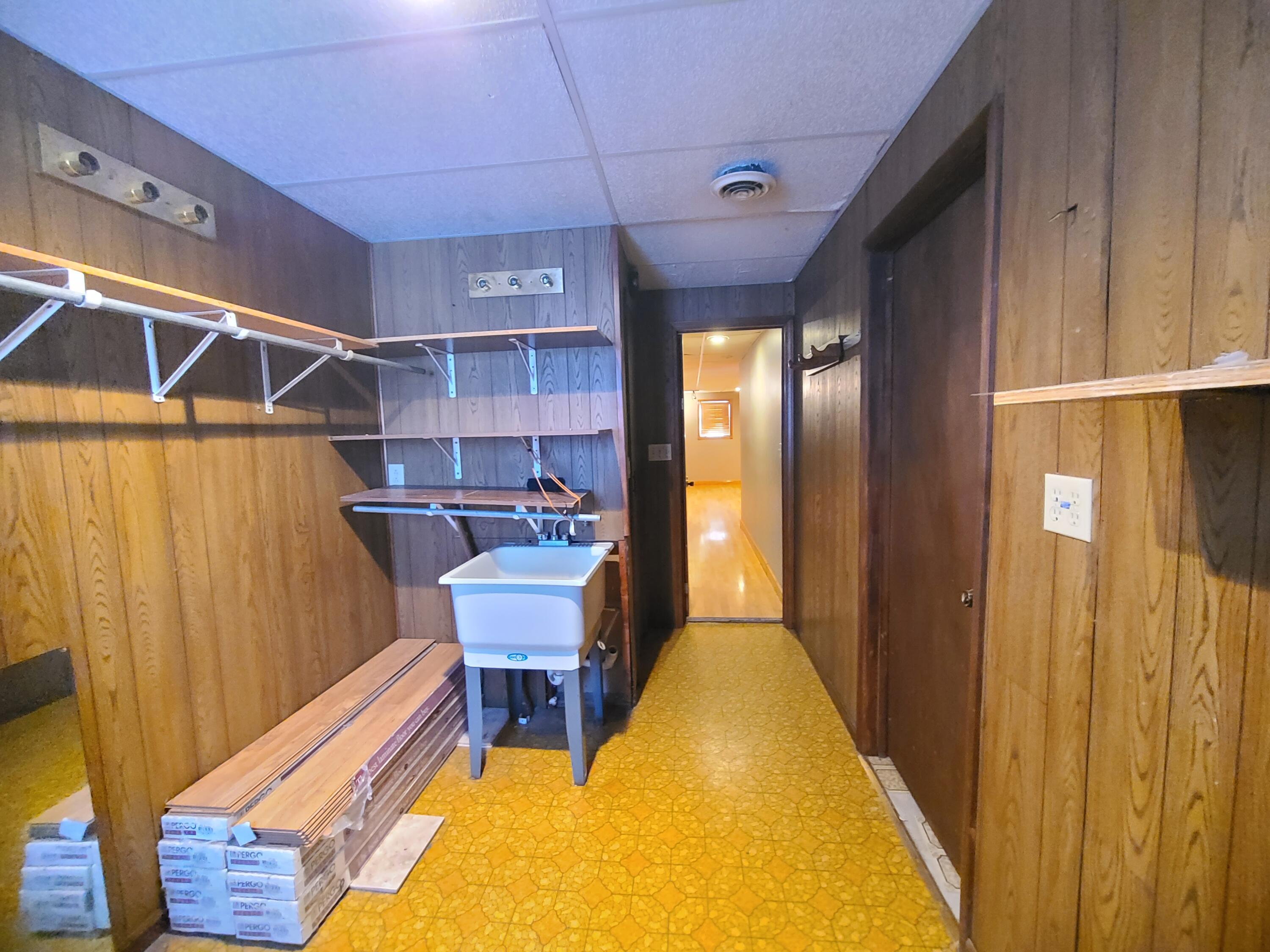 13291 County Road 700 West Demotte, IN 46310 - Photo 33 of 33 a view of a hallway with wooden chairs