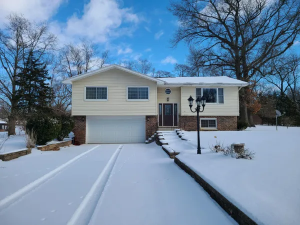 a view of a house with a patio