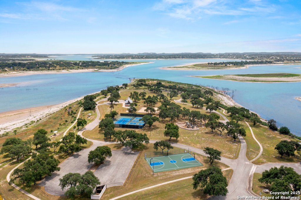 336 River Cliff Place Spring Branch, TX 78070 - Photo 12 of 14 an aerial view of ocean and residential houses with outdoor space