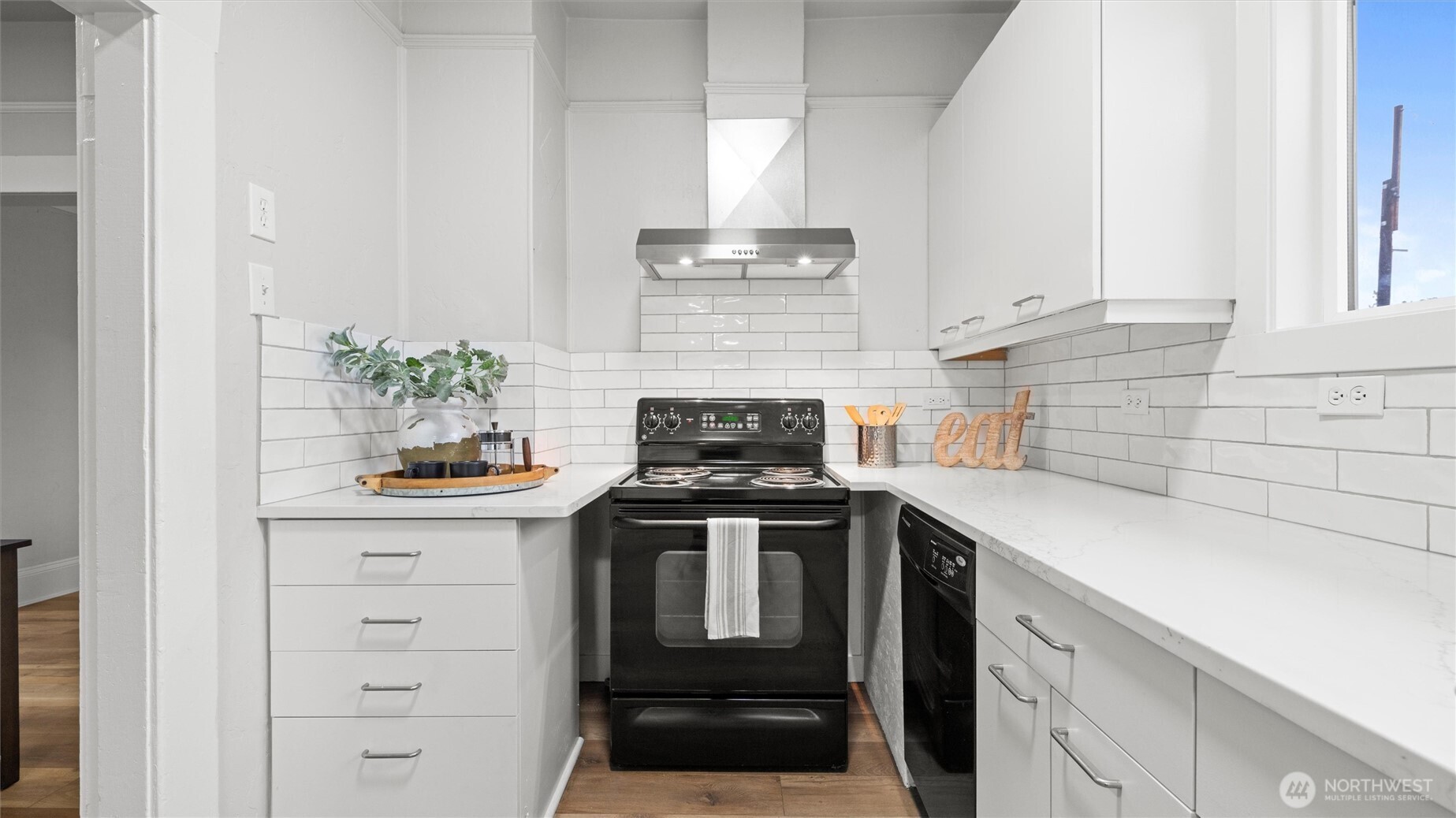 7 Second Street Touchet, WA 99360 - Photo 20 of 33 a kitchen with stainless steel appliances granite countertop a stove and white cabinets