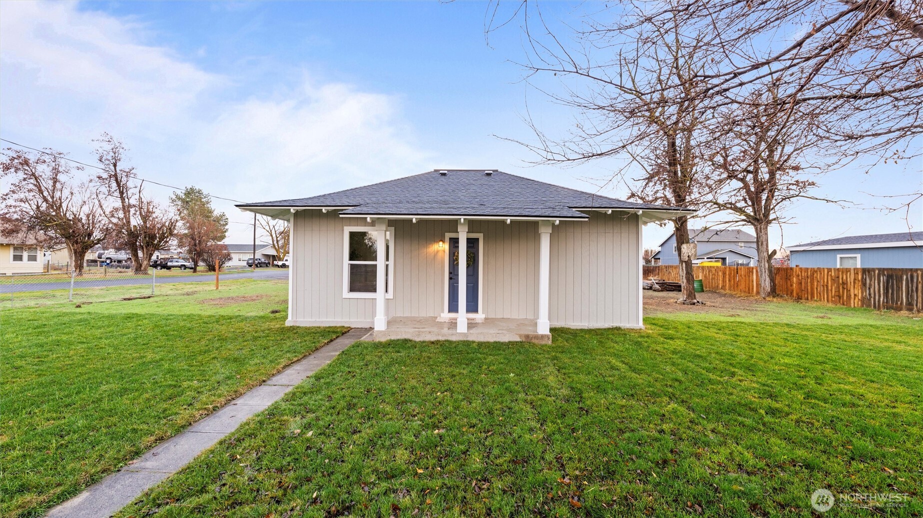 7 Second Street Touchet, WA 99360 - Photo 2 of 33 a front view of house with yard and trees