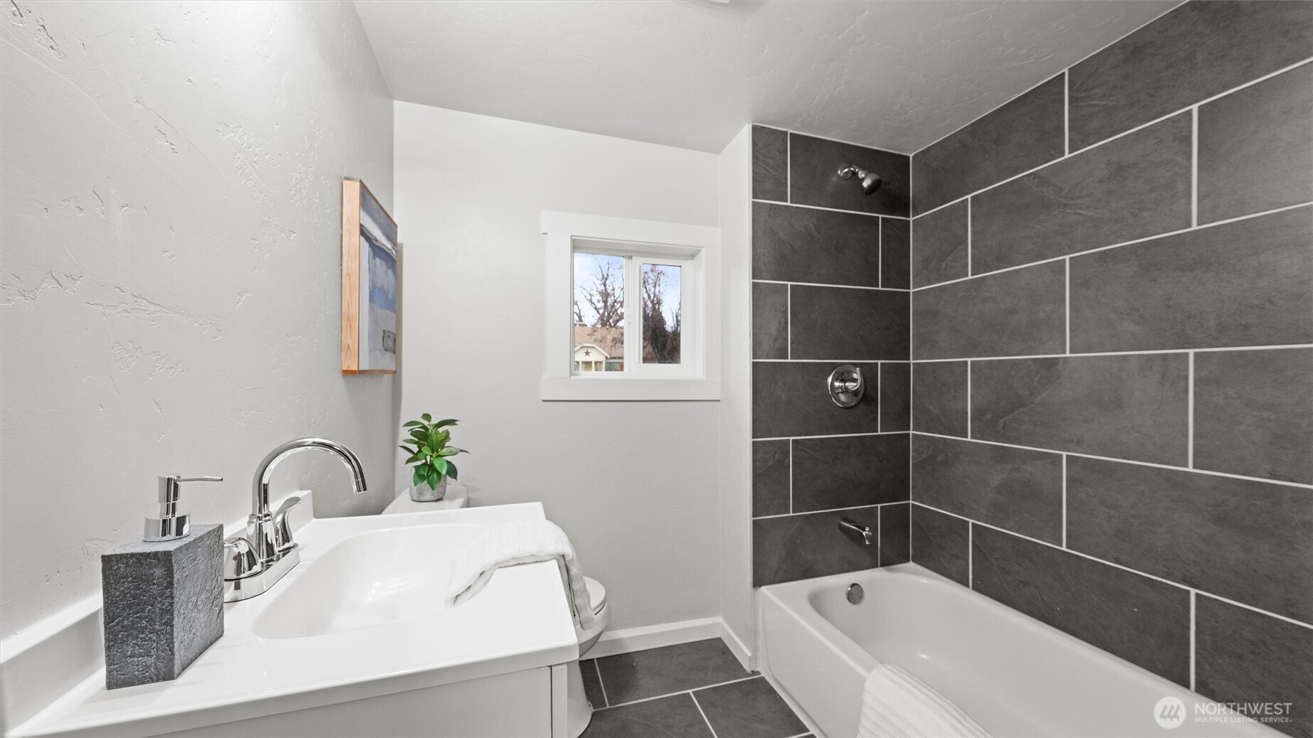 7 Second Street Touchet, WA 99360 - Photo 22 of 33 a bathroom with a sink toilet and shower