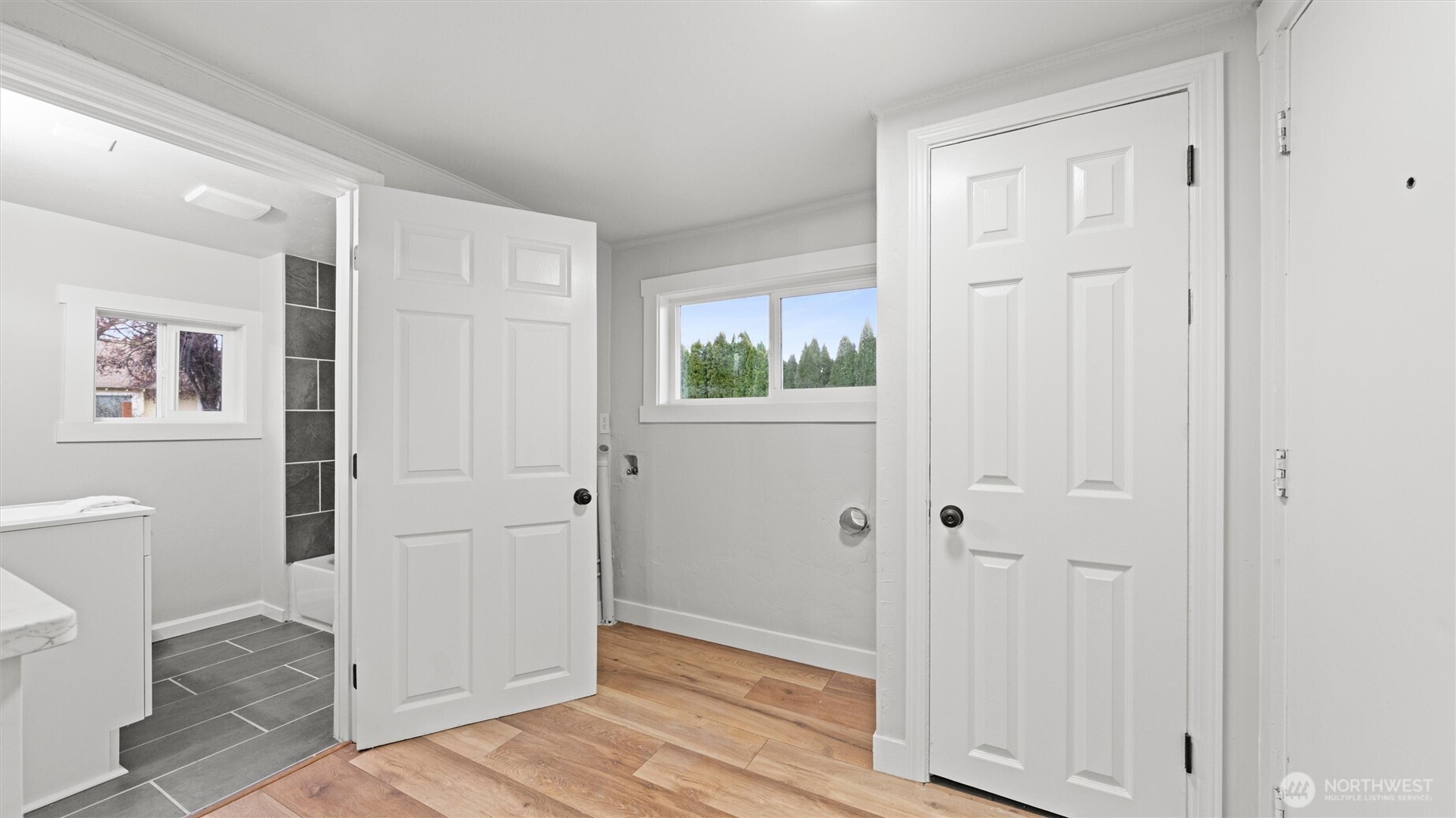 7 Second Street Touchet, WA 99360 - Photo 23 of 33 a view of a bathroom with wooden floor and closet area