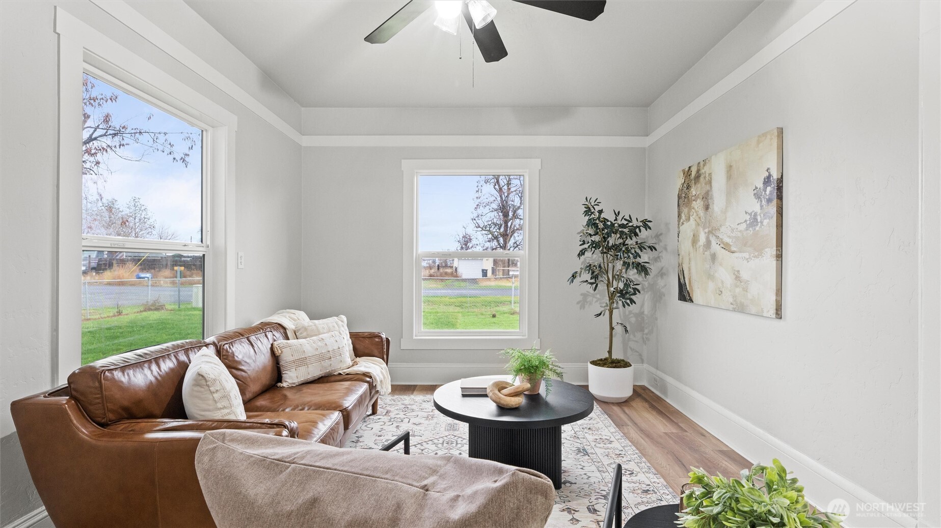 7 Second Street Touchet, WA 99360 - Photo 7 of 33 a living room with furniture and a large window