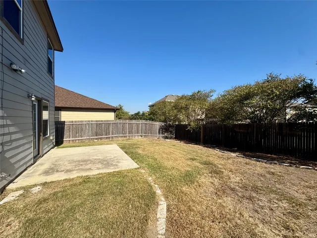 a swimming pool with a yard