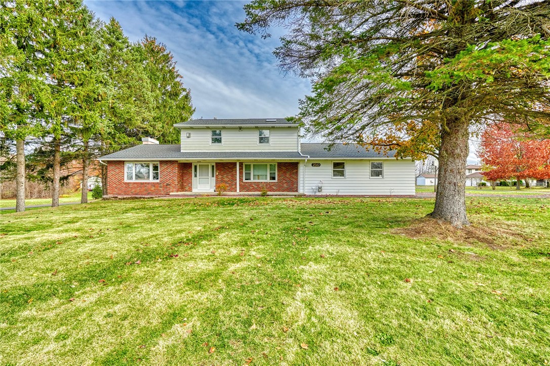 WELCOME TO 250 WEBSTER RD! ATTRACTIVE BRICK FRONT