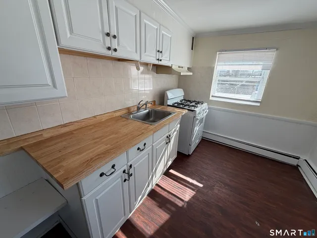 a storage room with wooden floor