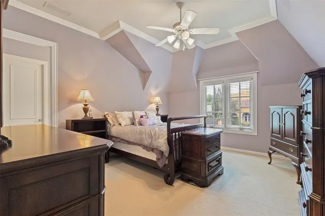 a bedroom with bed and window