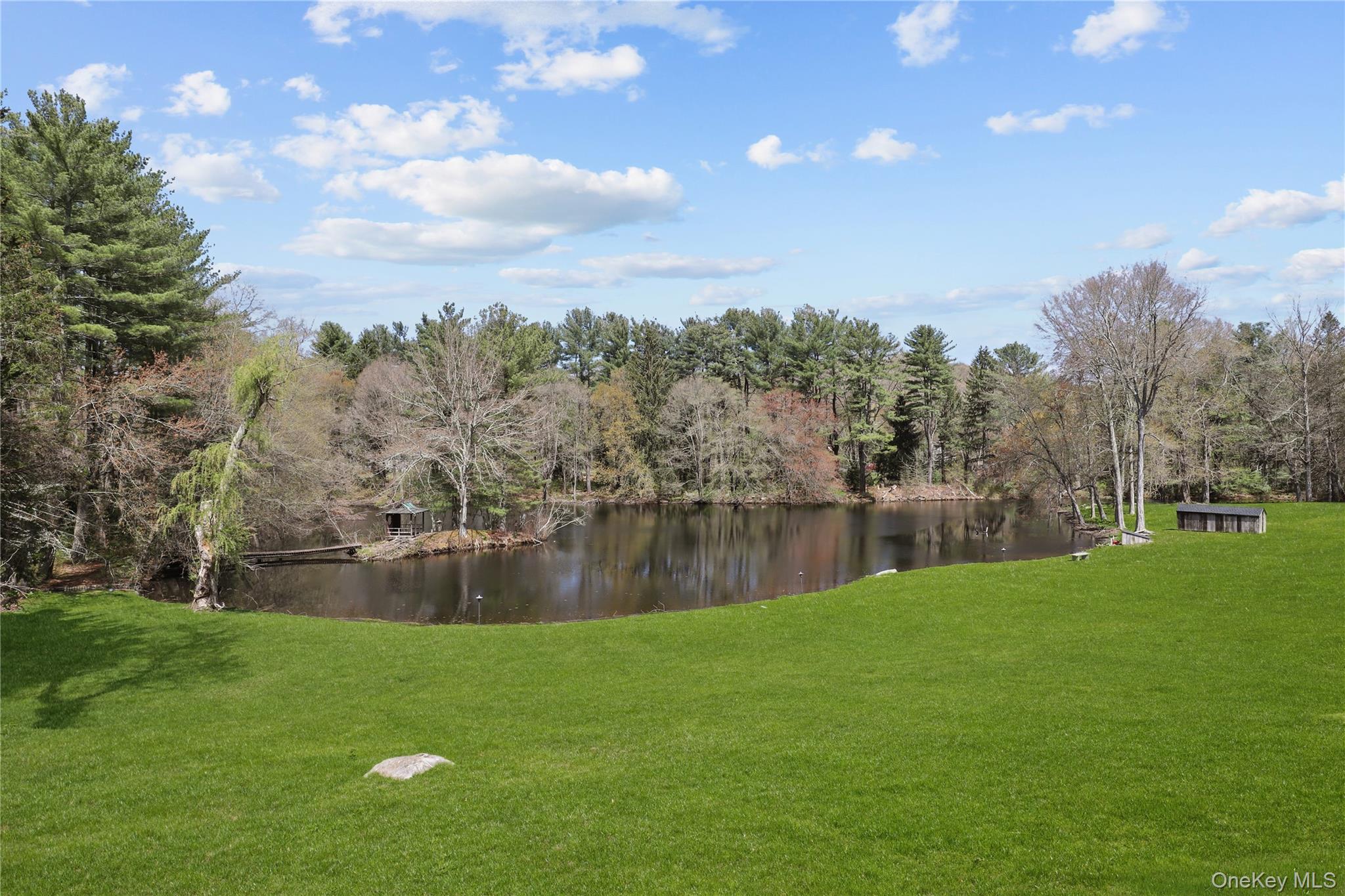 39 Old Snake Hill Road Pound Ridge, NY 10576 - Photo 14 of 37 a view of a lake
