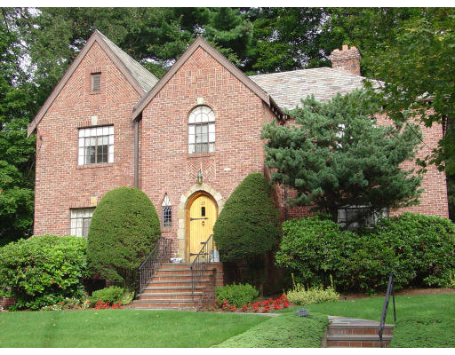 25 West Boulevard Road Newton, MA 02459 - Photo 1 of 8 a front view of a house with a yard