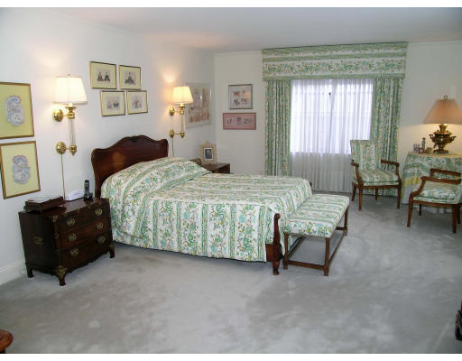 25 West Boulevard Road Newton, MA 02459 - Photo 7 of 8 a bedroom with a bed and a couch