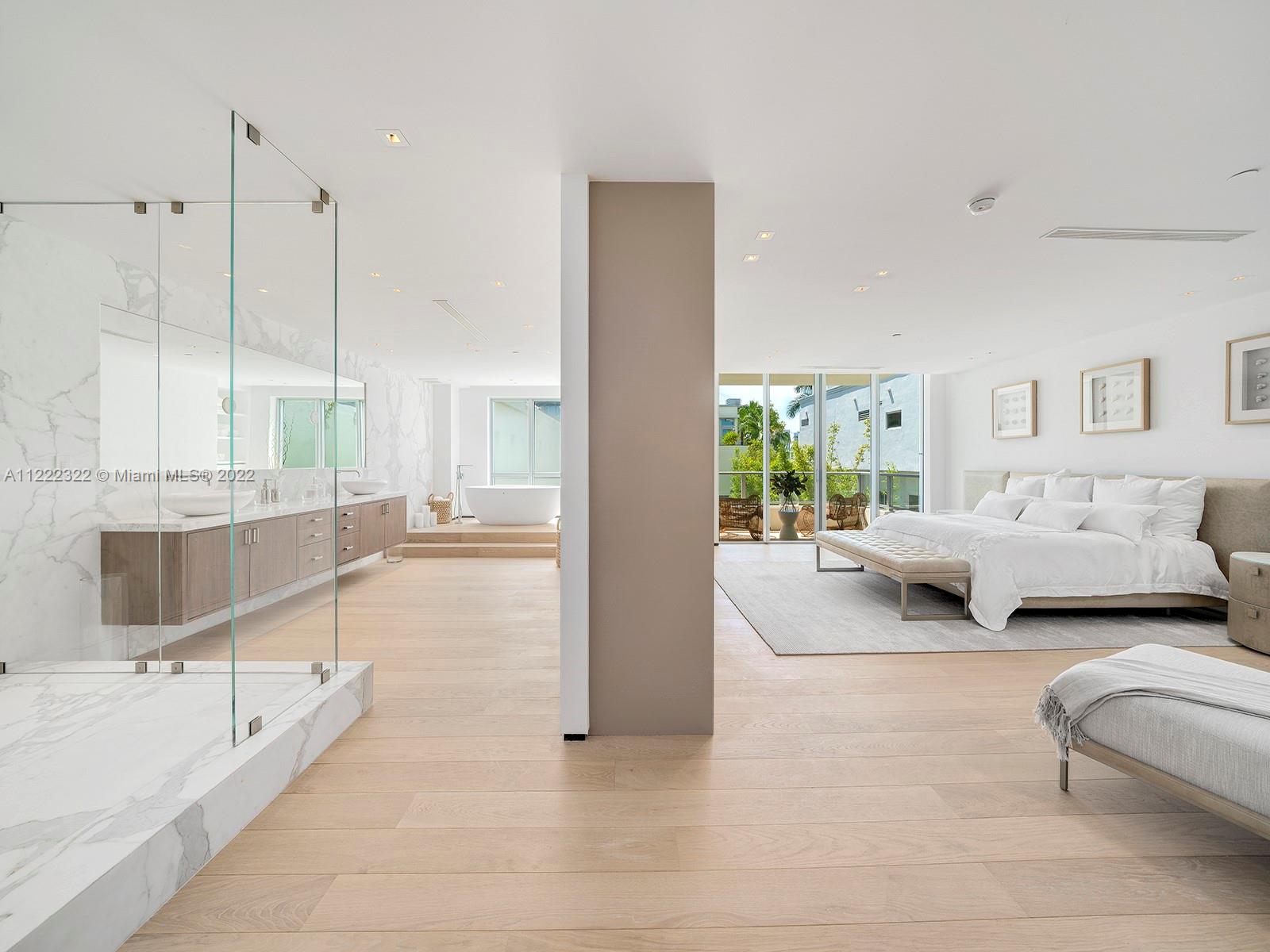 125 Ocean Drive, Unit U0301 Miami Beach, FL 33139 - Photo 12 of 15 a bedroom with furniture and a large window