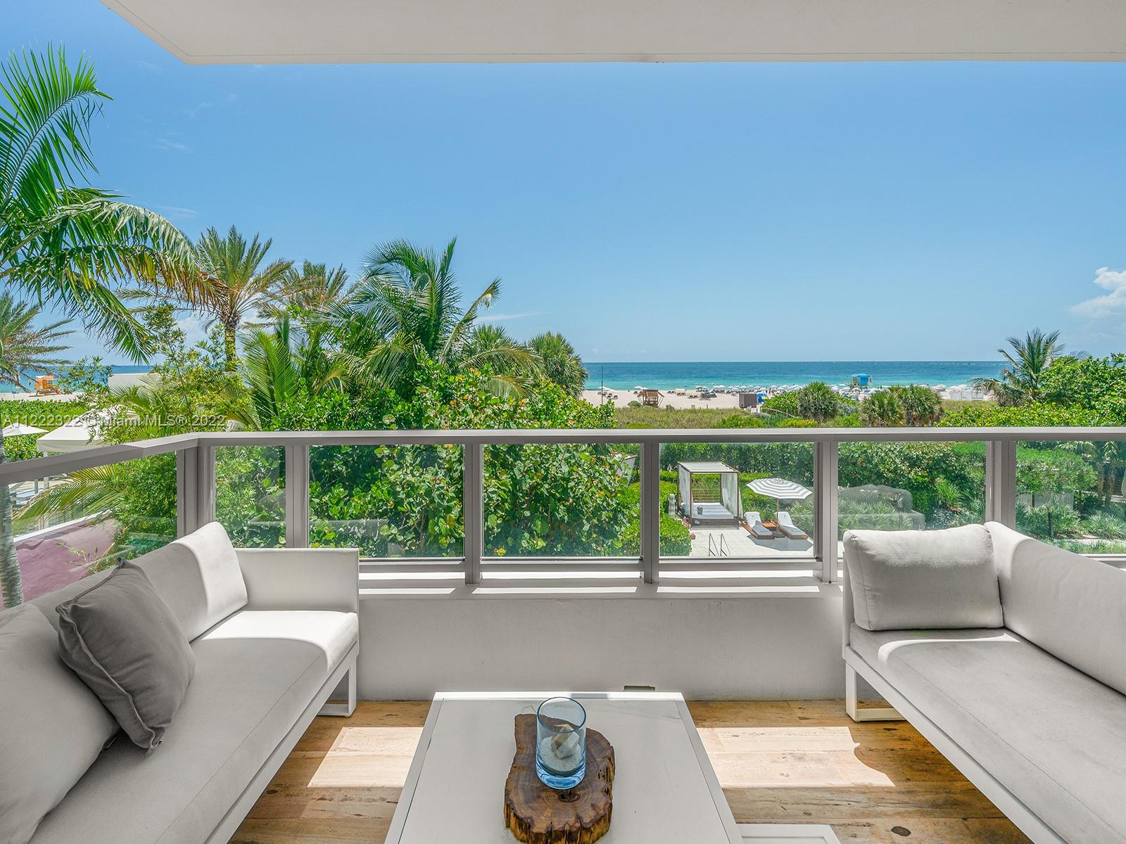 125 Ocean Drive, Unit U0301 Miami Beach, FL 33139 - Photo 2 of 15 a balcony with a couch