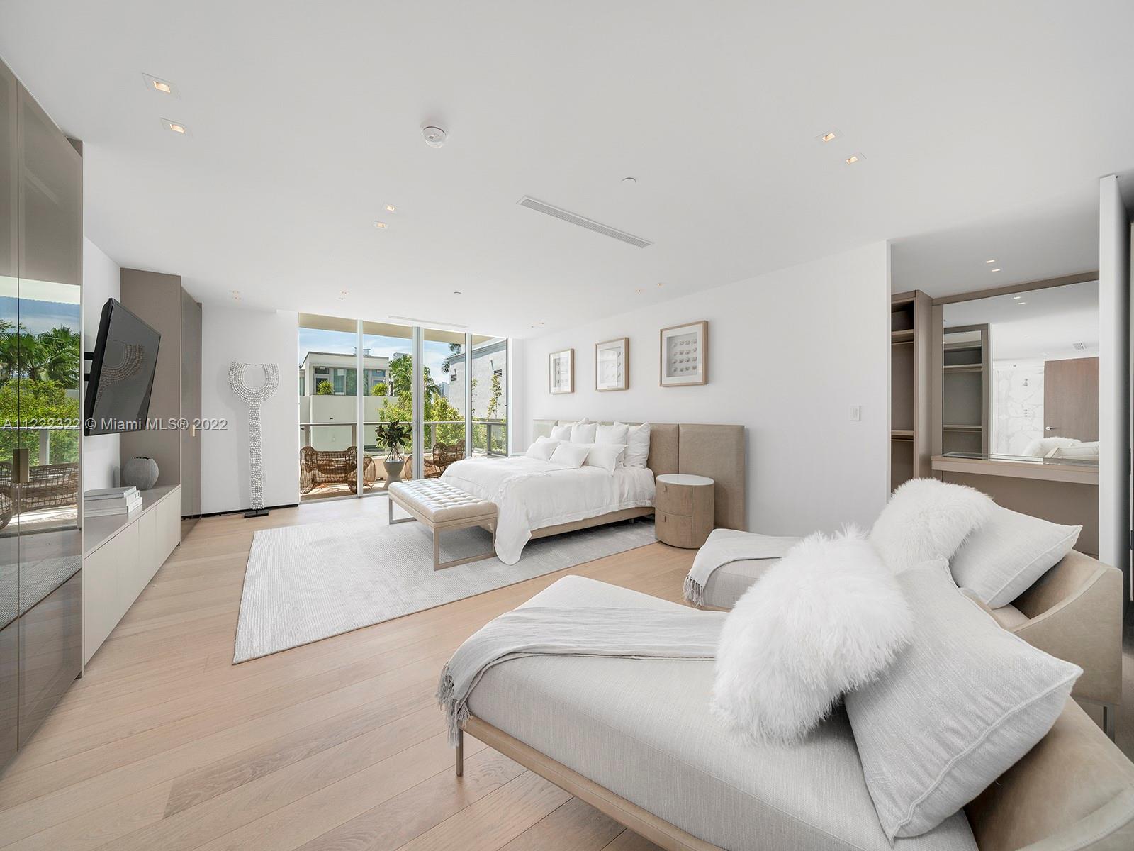 125 Ocean Drive, Unit U0301 Miami Beach, FL 33139 - Photo 4 of 15 a living room with furniture and a large window
