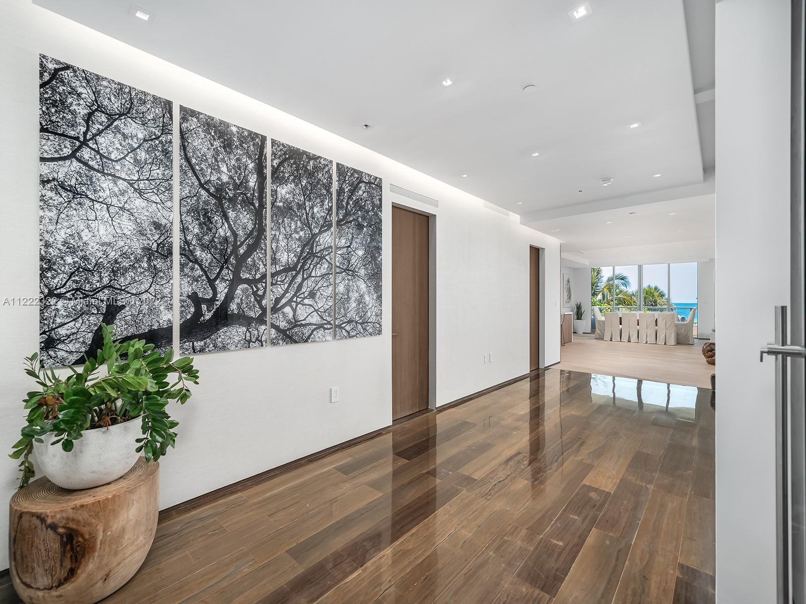 125 Ocean Drive, Unit U0301 Miami Beach, FL 33139 - Photo 10 of 15 a view of an entryway with wooden floor