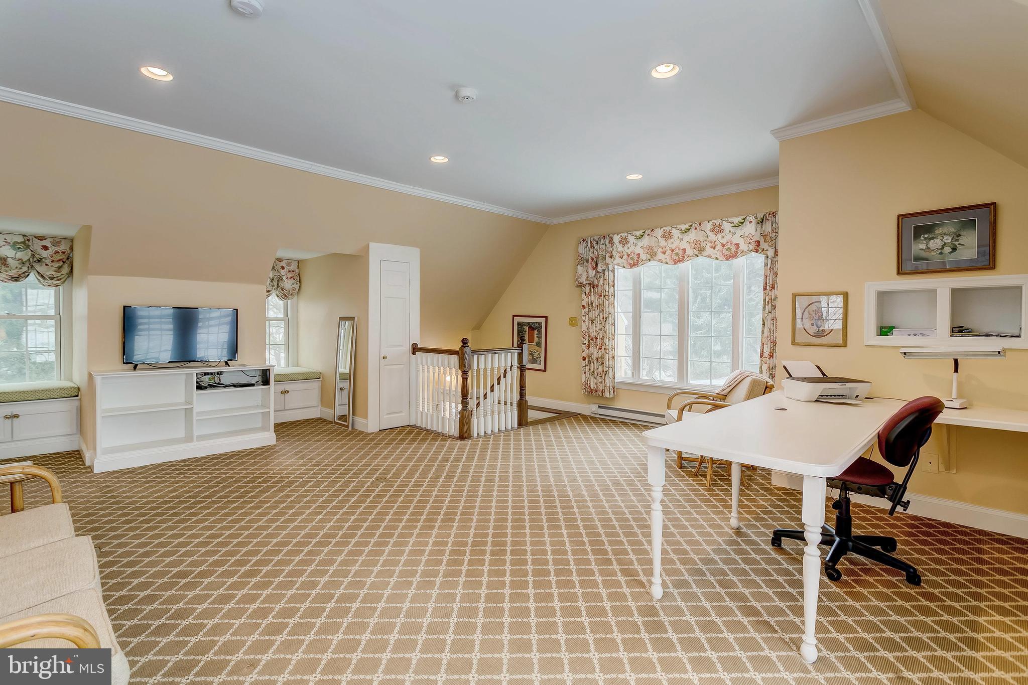 2909 A Butler Road Reisterstown, MD 21136 - Photo 18 of 28 a living room with furniture a flat screen tv and a table