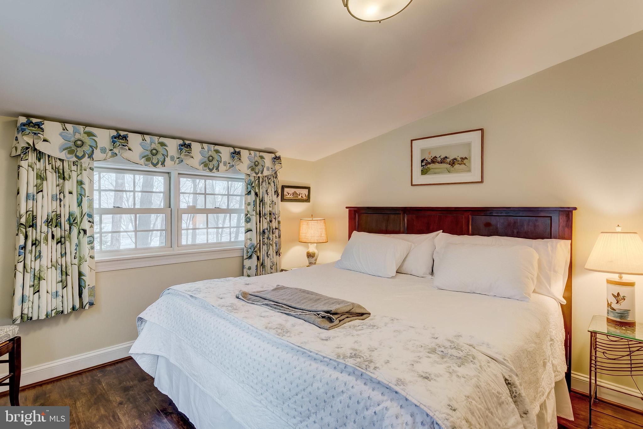 2909 A Butler Road Reisterstown, MD 21136 - Photo 21 of 28 a bedroom with a large bed and a window