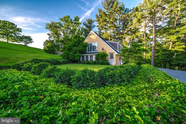 a house view with a garden space