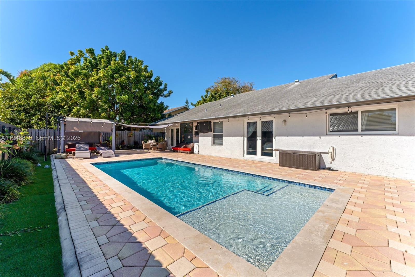 12210 Southwest 92nd Street Miami, FL 33186 - Photo 21 of 38 a view of a house with pool
