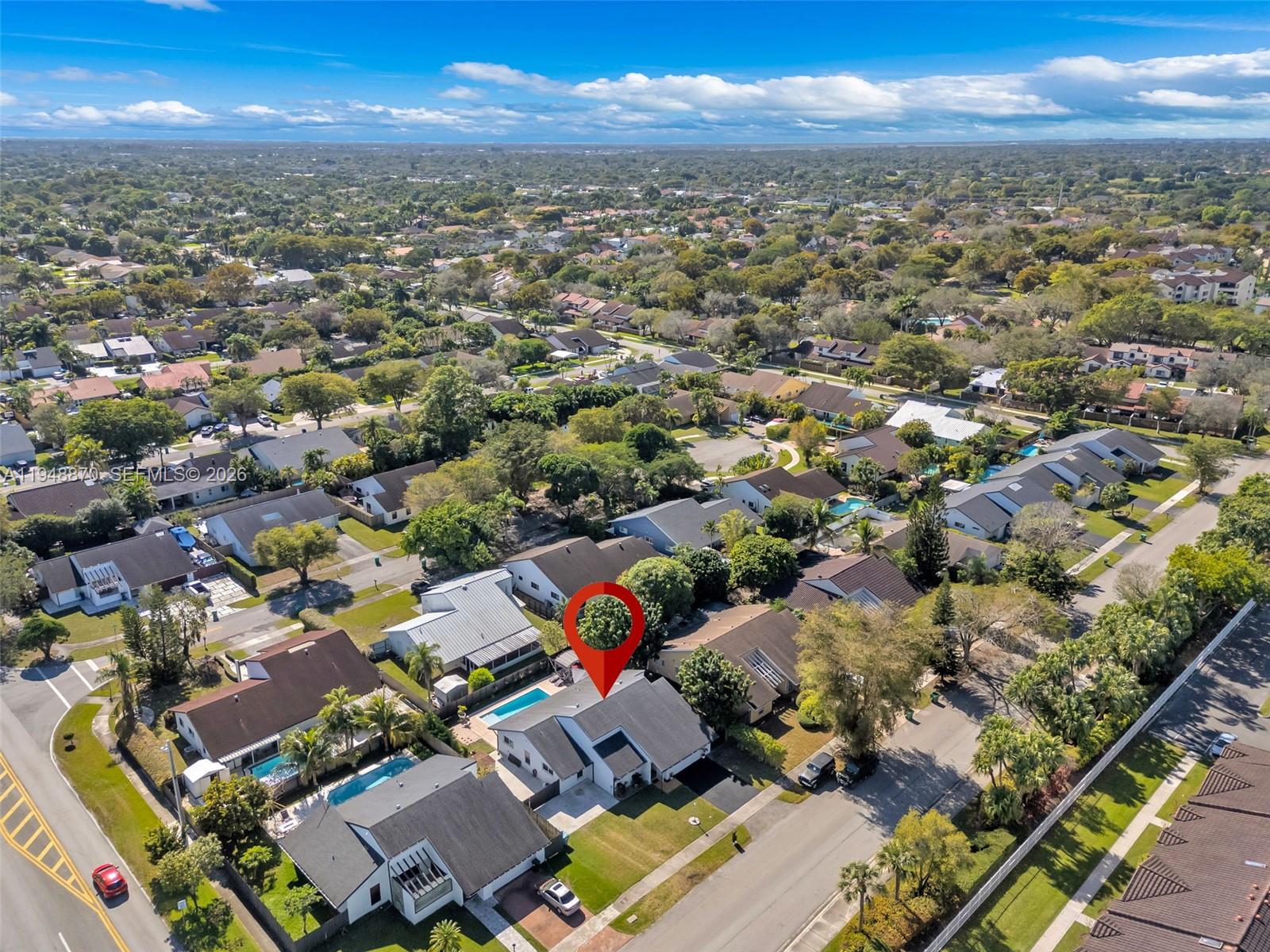 12210 Southwest 92nd Street Miami, FL 33186 - Photo 31 of 38 an aerial view of residential houses with outdoor space