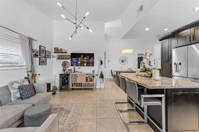 a living room with furniture and a table
