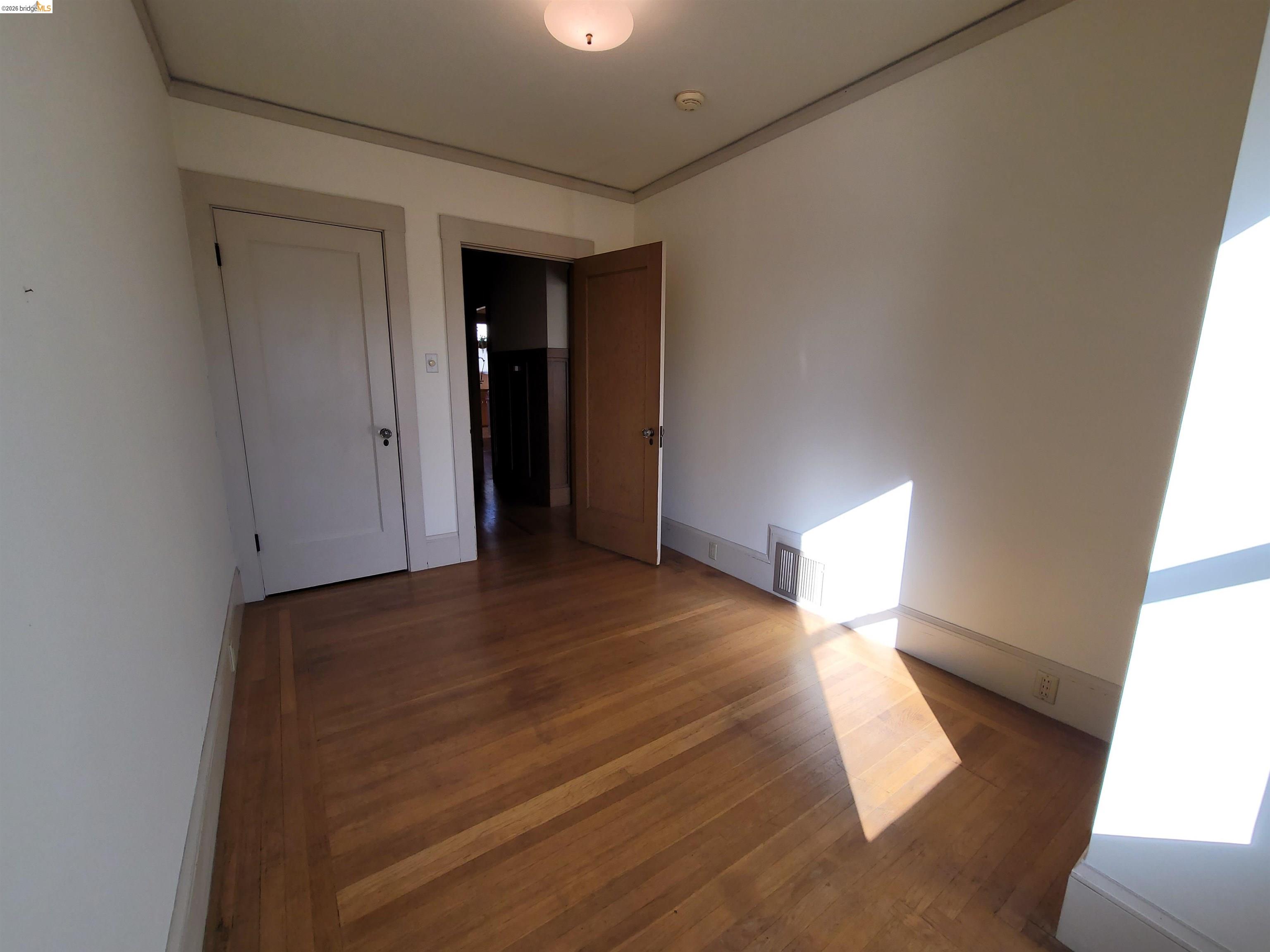 1901 Parker Street, Unit 3 Berkeley, CA 94704 - Photo 15 of 27 a view of an empty room and window
