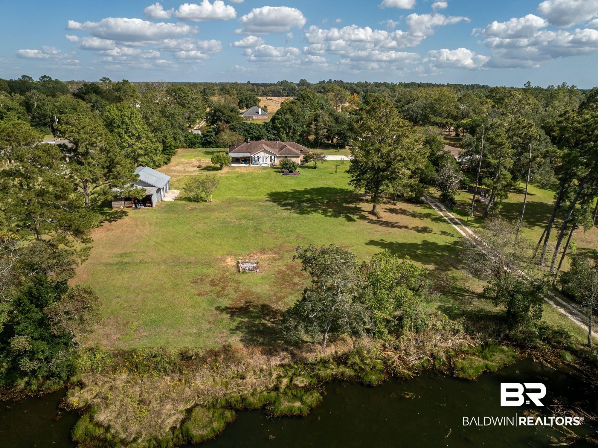 20037 County Road 33 Fairhope, AL 36532 - Photo 72 of 79 Birds eye view of property featuring a water view