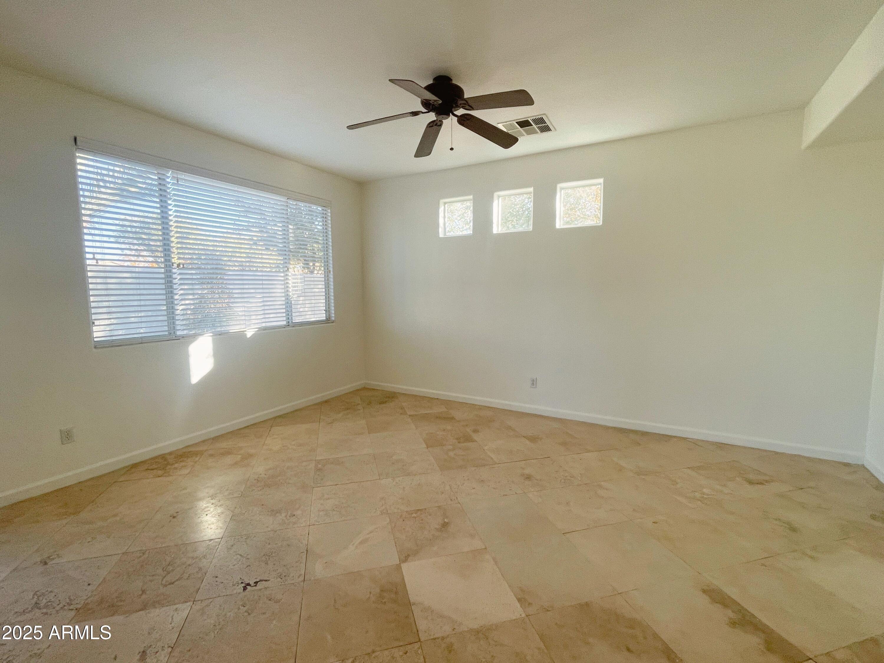 2211 South Harper Mesa, AZ 85209 - Photo 11 of 27 a view of an empty room with a window