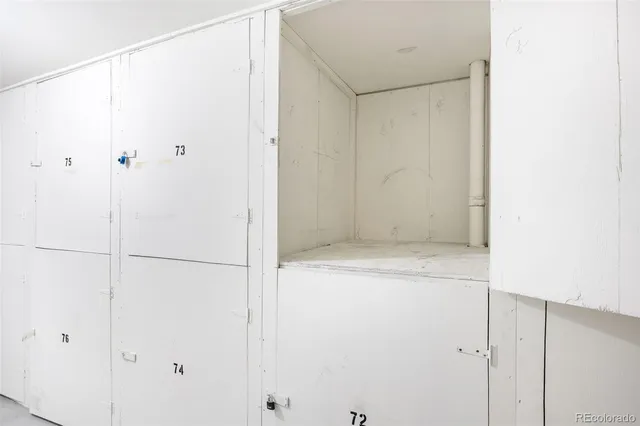 a view of a brick house with a large windows