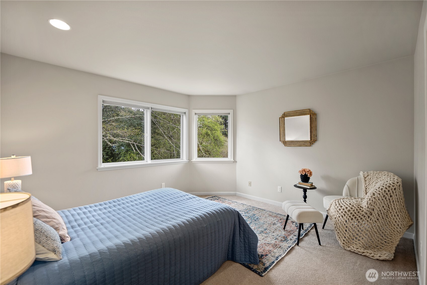 17421 95th Place Southwest Vashon, WA 98070 - Photo 17 of 32 a bedroom with a bed and a window