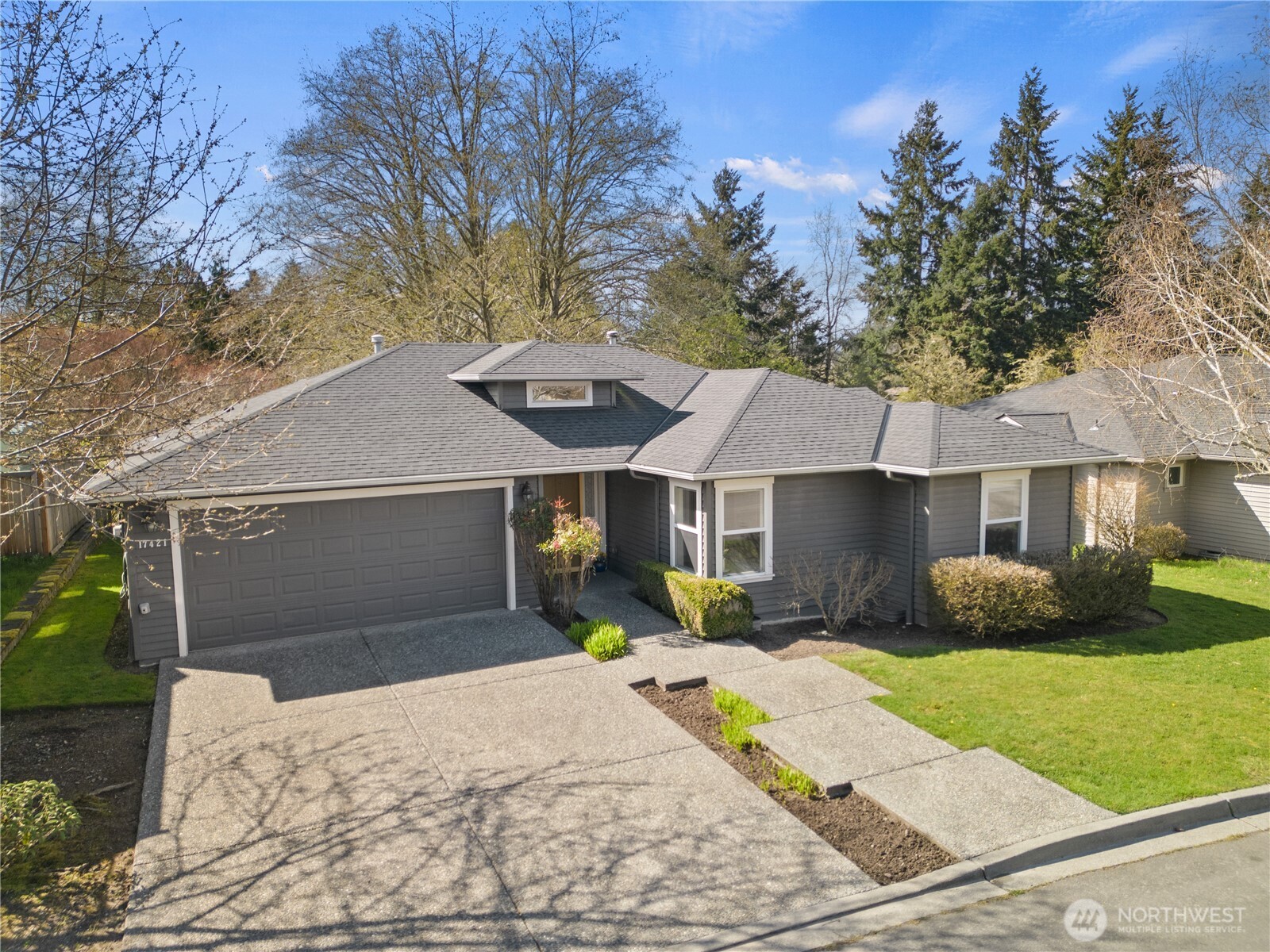 17421 95th Place Southwest Vashon, WA 98070 - Photo 29 of 32 a front view of a house with garden