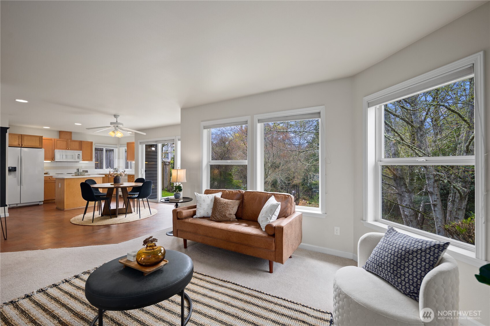 17421 95th Place Southwest Vashon, WA 98070 - Photo 7 of 32 a living room with furniture and a large window