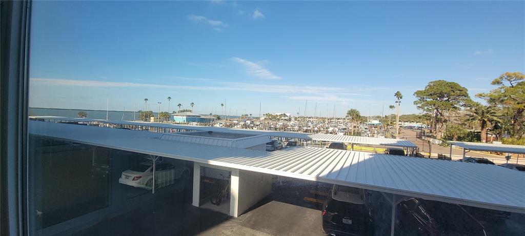 632 Edgewater Drive, Unit 235 Dunedin, FL 34698 - Photo 12 of 37 a view of a balcony with an outdoor space