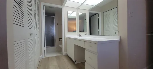 a view of living room with furniture and flat screen tv