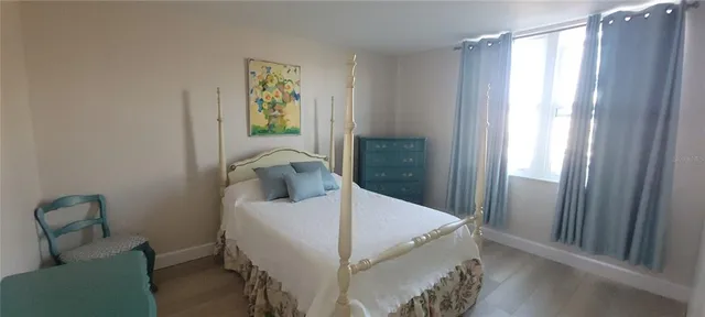 a bathroom with a shower and a toilet