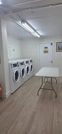 a stove top oven sitting inside of a kitchen