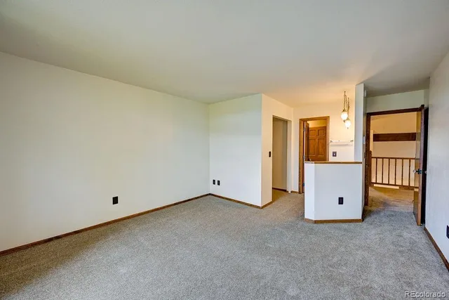 a view of an empty room with window