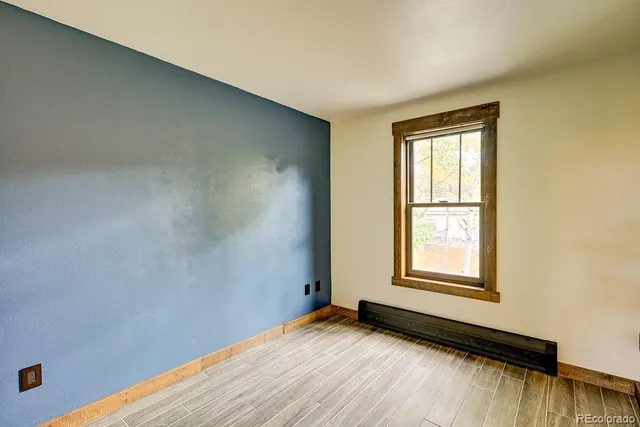 an empty room with window