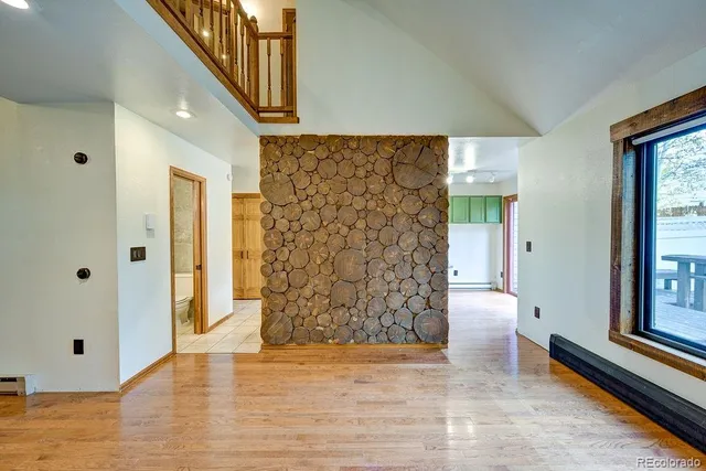 a view of entryway with wooden floor